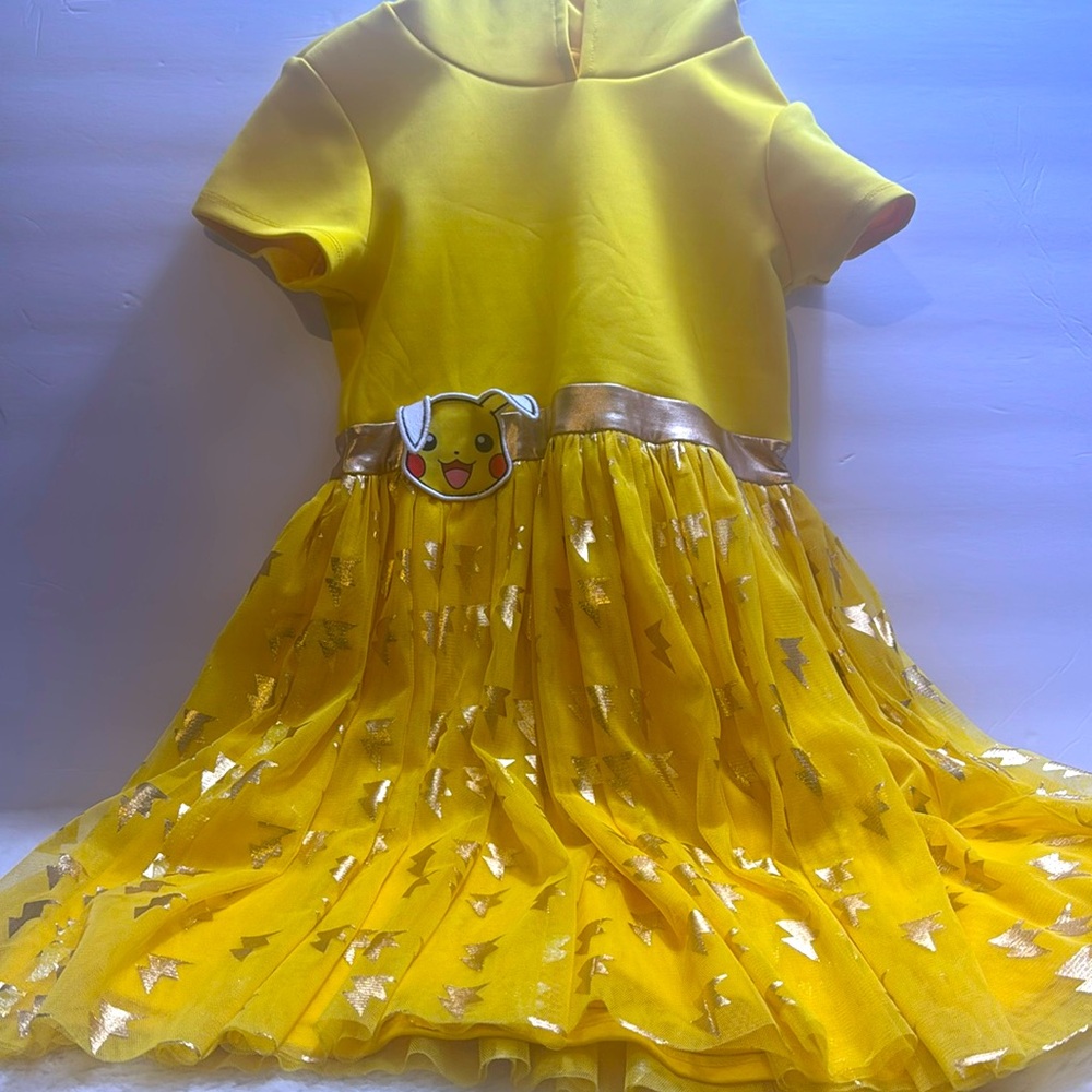 Pokémon yellow and gold dress size 7/8 with hoodie. Like new!